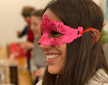 A woman with a pink mask